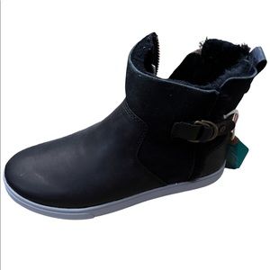 Olukai Womens’s black boot.